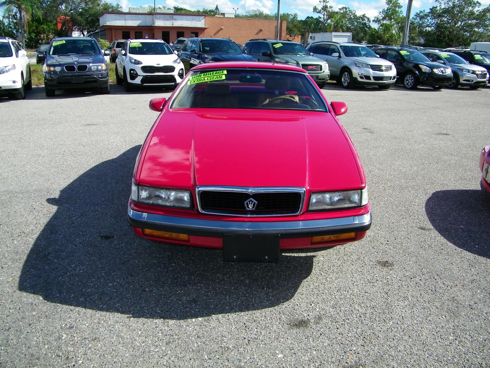 1991 Red /Beige Chrysler TC By Maserati Convertible (ZC2FS1207MB) with an 3.0L V6 SOHC 12V engine, 4-Speed Automatic Overdrive transmission, located at 4000 Bee Ridge Road, Sarasota, FL, 34233, (941) 926-0300, 27.298664, -82.489151 - Photo #1